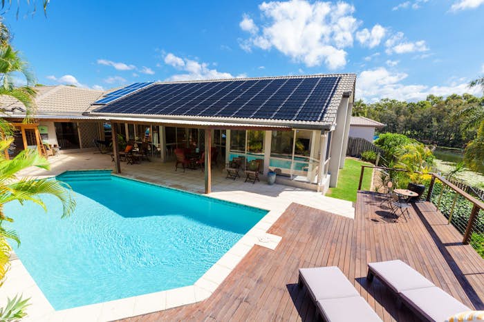 Solar panels on a pool house roof